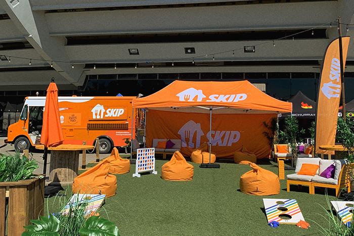 SkipTheDishes food truck, tent, and lawn games