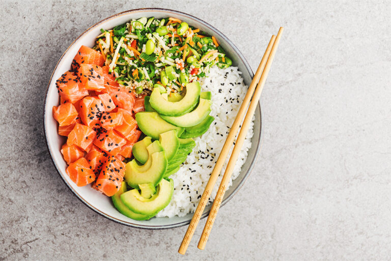 Salmon poke bowl with fresh avocado.